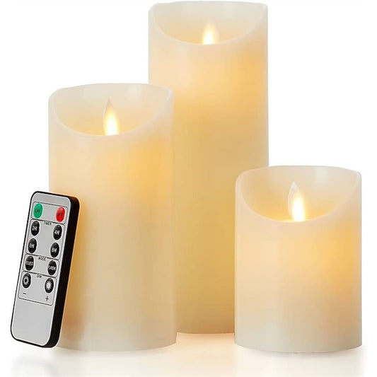 Set of three ivory flameless LED pillar candles with remote and timer